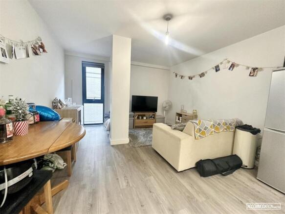 Bright, sociable living space with modern floor...