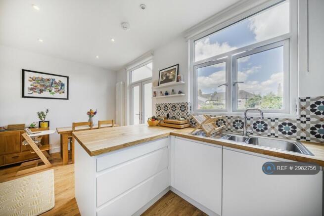 Open-Plan Layout Between Kitchen And Dining Room