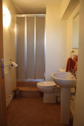 Cloaks/Shower Rm