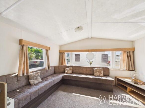 Bright lounge with wrap-around seating and large w