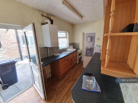 Kitchen With Back Garden Entrance