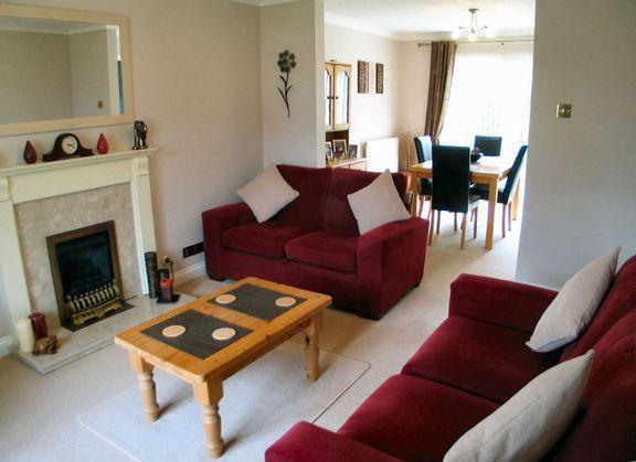 Sitting room through to dining room