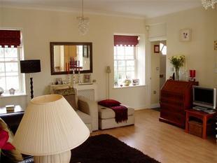 FURTHER LIVING ROOM PHOTOGRAPH
