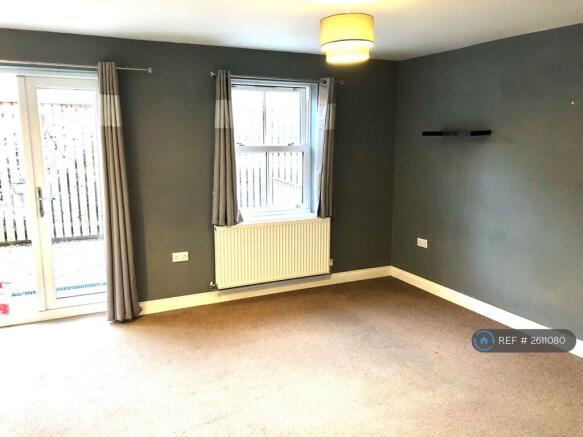 Sitting Room And French Doors To Patio Gatden