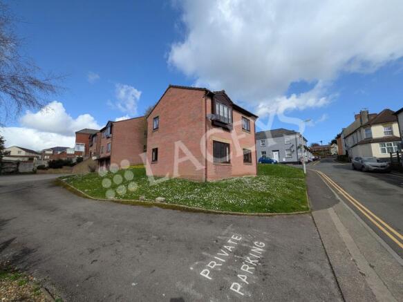 Side of property leading to parking area