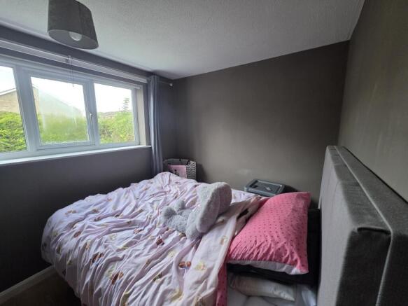 Bedroom with window to rear