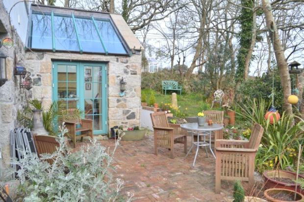 Sunroom With Patio
