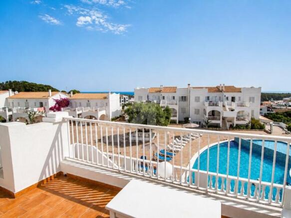 Apartment with pool and sea views in Arenal d'en Castell