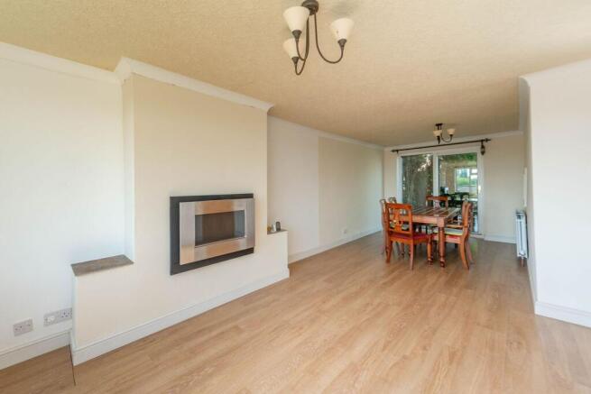 THROUGH SITTING/DINING ROOM & KITCHEN