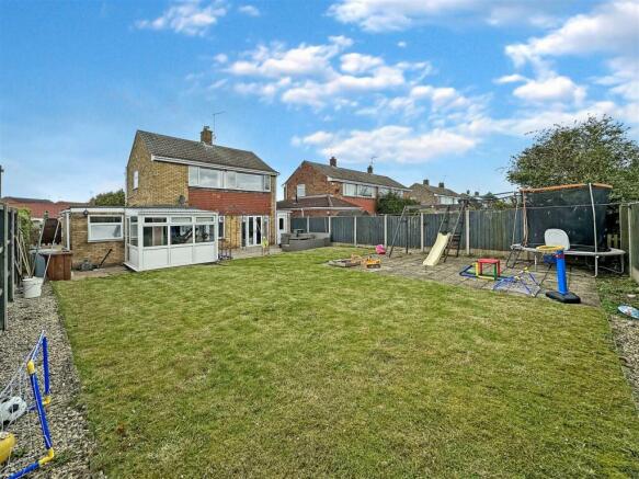 Well-Appointed Garden & Rear Elevation 700
