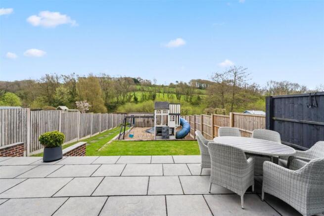 Garden - dining patio and play area.jpg
