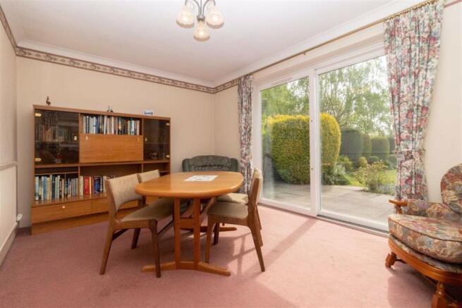 REAR DINING/SITTING ROOM
