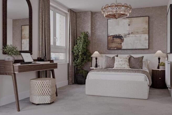 Wide angle of bedroom with study desk