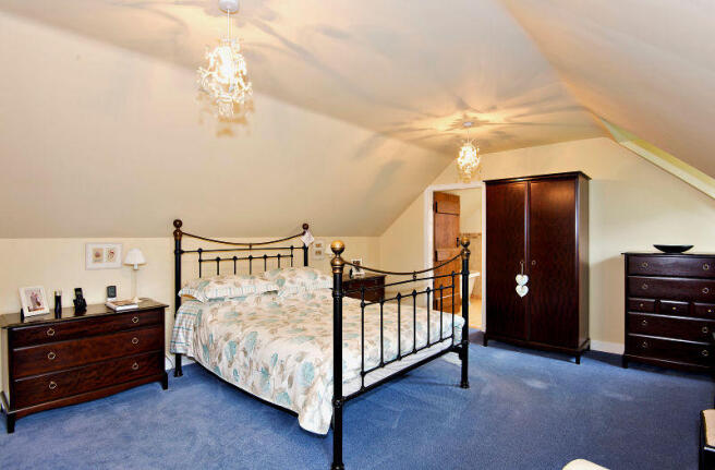 Large Master Bedroom leading to en-suite.  Walk-in