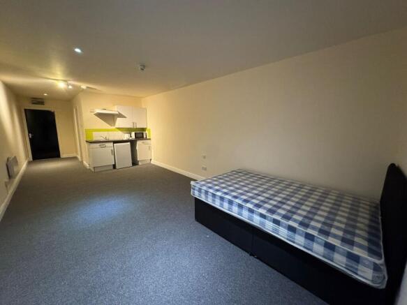 Bright and spacious living area featuring a com...