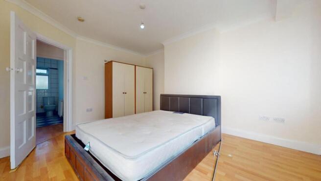 Bright double bedroom with ample storage space...