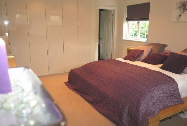 Bedroom 1 with wall to wall wardrobes