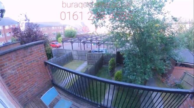 Well-kept private garden with paved seating are...