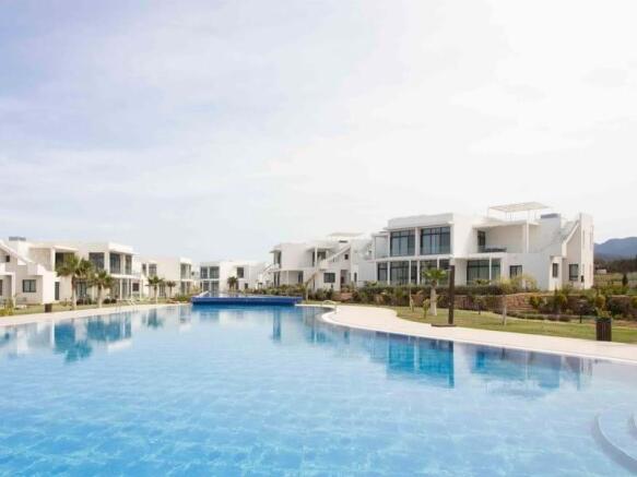 2-bedroom modern garden apartment + communal swimming pools + within a perfect holiday complex with many amenities Image 9999 2