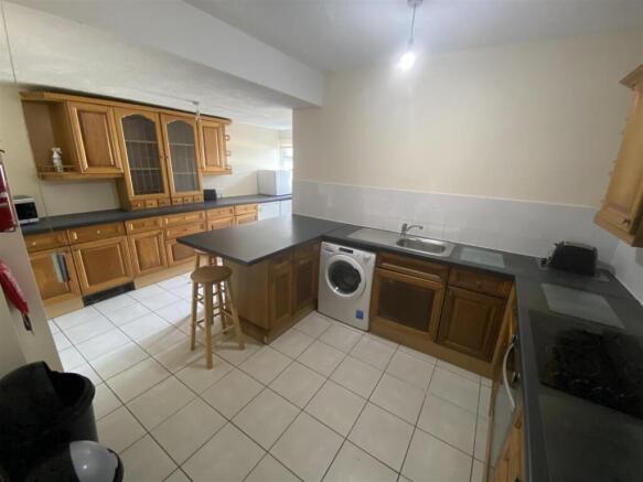 Spacious kitchen with a breakfast bar area....