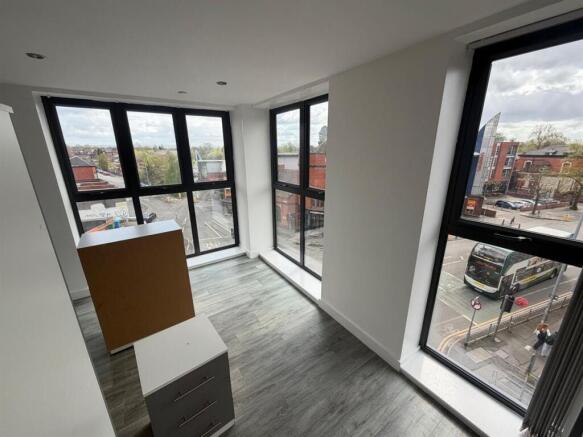 Bright modern room with expansive large windows...