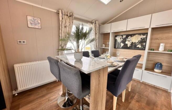 Atlas Laburnum Lodge Dining Area At Hoburne Cotswo