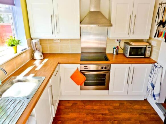 Smart modern kitchen overlooking garden.jpg