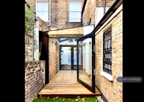 Conservatory Opening To Private Garden