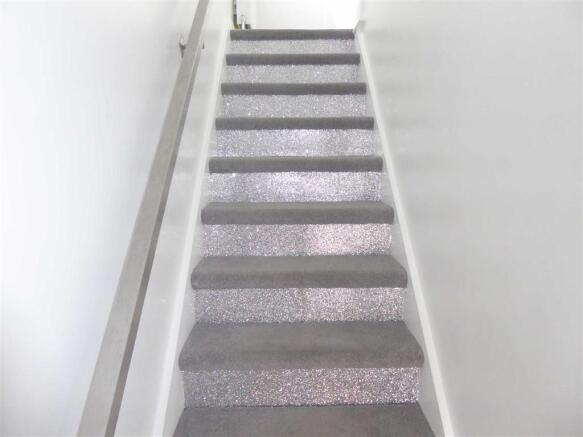 TO THE FIRST FLOOR: