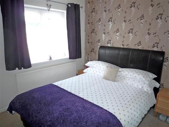 BEDROOM 1 (Rear):