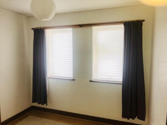 2nd bedroom with fitted wadrobe.  