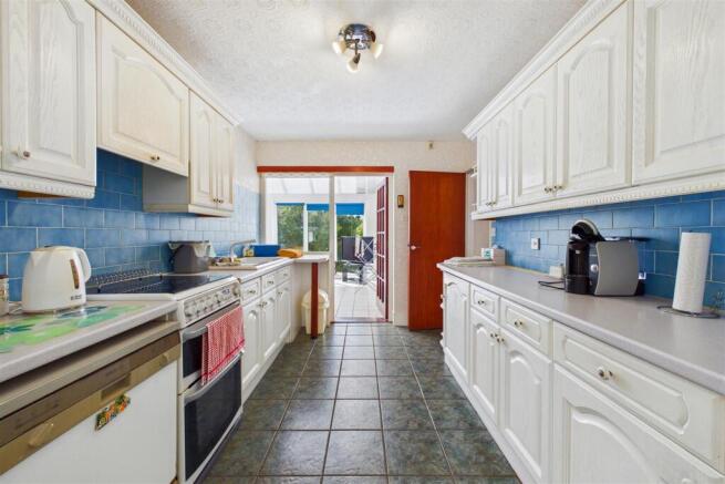 Kitchen to Sun Room.