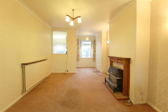 DINING/SEPARATE SITTING ROOM
