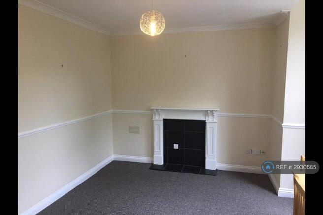 Lounge Area With Feature Fireplace