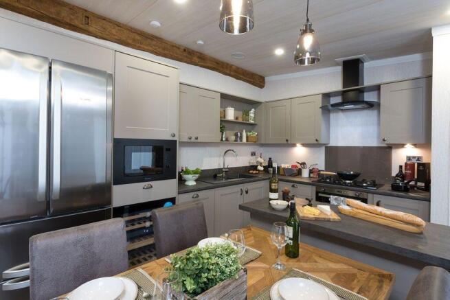 Luxury Kitchen With Island, Dining Area And Integr