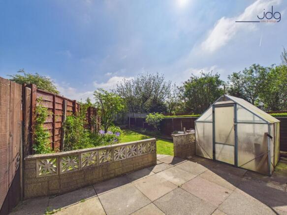 Private, well-established garden with lawn, patio seating and space to grow