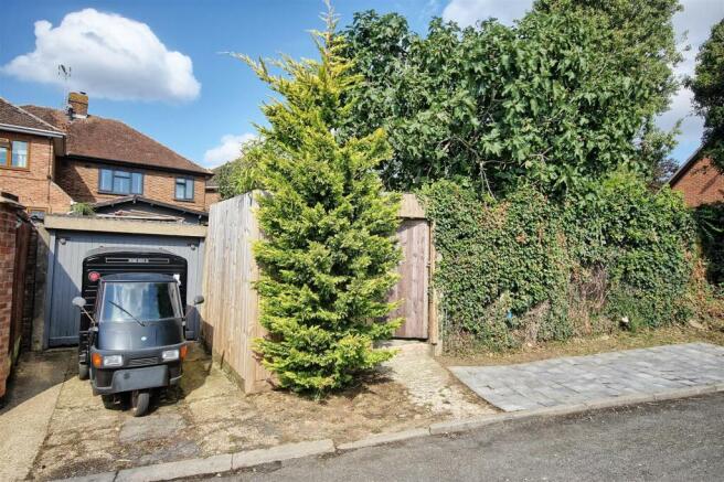 GARAGE AND REAR DRIVE