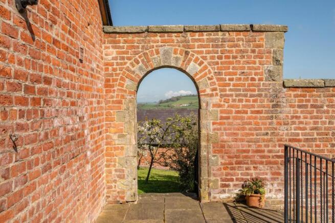 Archway to front garden.jpg
