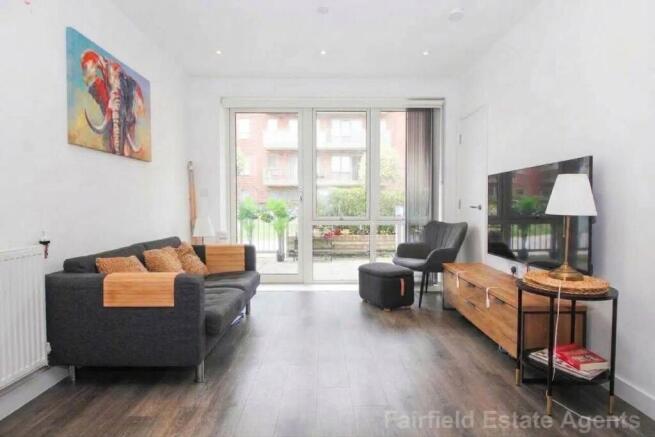 OPEN PLAN LIVING AND KITCHEN AREA
