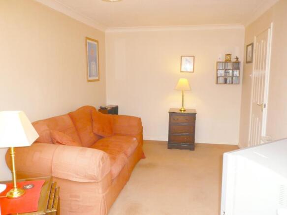 Bedroom 2  which currently serves as a Sitting Roo