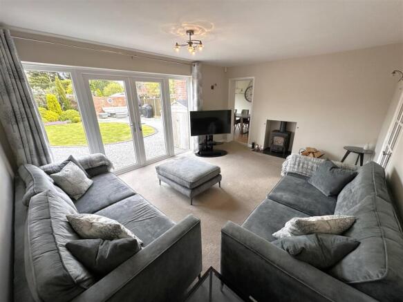 Generous Living Room With French Doors 220