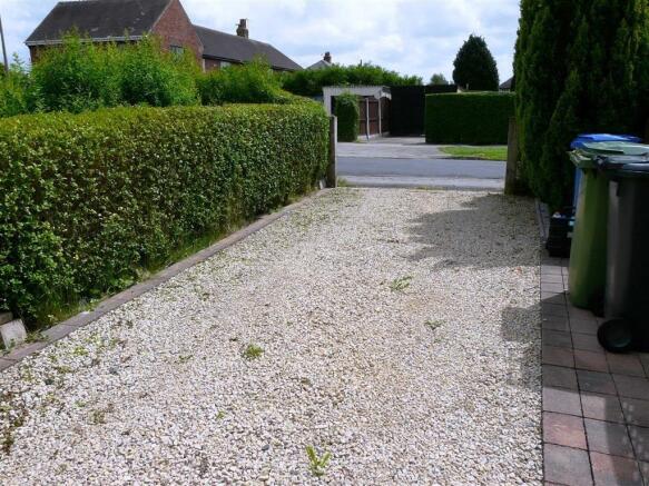 REAR GRAVELLED AREA