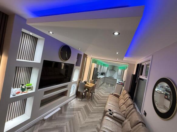 Contemporary open-plan living area with built-i...