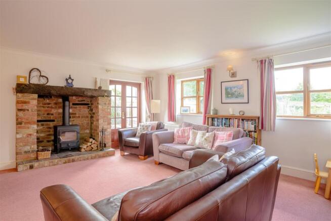 Spacious Lounge with Wood Burner