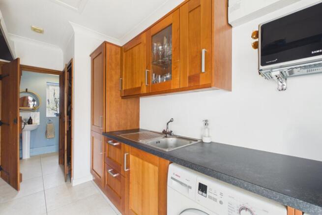 Lots of storage and space to do laundry away from 