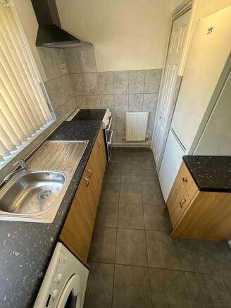 Bright, modern kitchen with ample counter space...