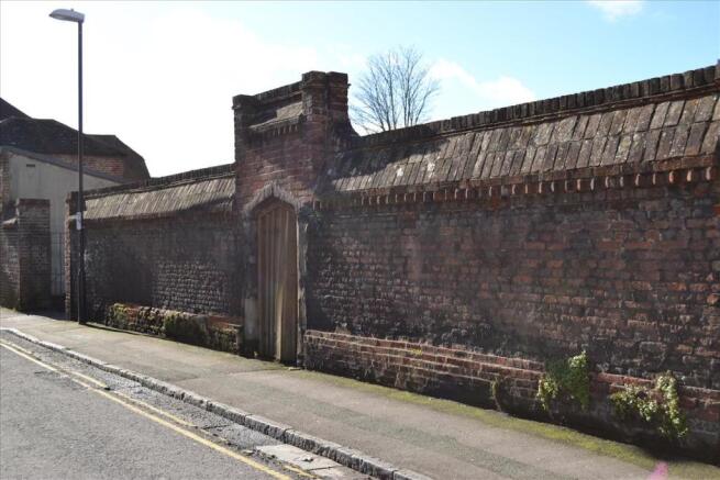 Rear boundary wall to Rollerstone Street