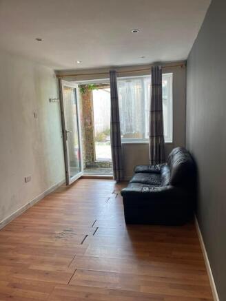 Cozy living space with direct access to garden...