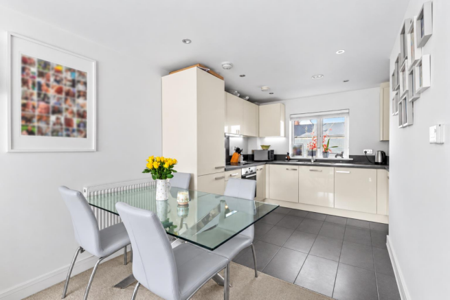 Pristine Modern Kitchen Dining Scene.png