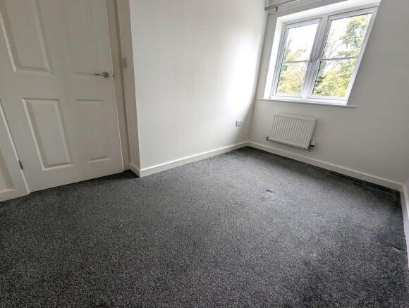 BEDROOM 2. FEONT.